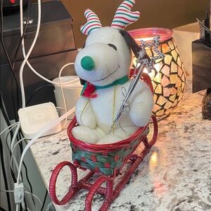 Festive Snoopy Plush Dog in Red and Green Sleigh with star wand